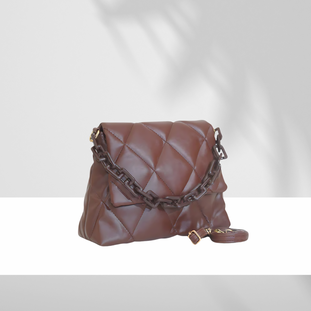 Chocolate brown quilted faux leather handbag with chunky chain detail and detachable shoulder strap on white background.