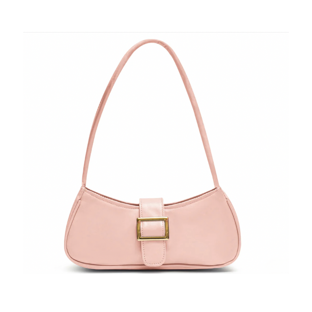Pink shoulder bag with front buckle detail and magnetic flap closure made from premium synthetic leather